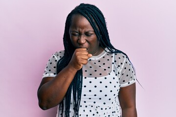 Poster - Young black woman with braids wearing casual clothes feeling unwell and coughing as symptom for cold or bronchitis. health care concept.