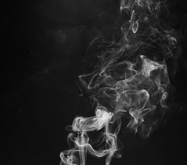 abstract fragment movement of white smoke on black background.