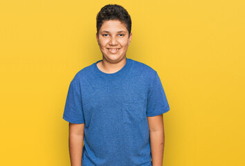 Sticker - Teenager hispanic boy wearing casual clothes with a happy and cool smile on face. lucky person.