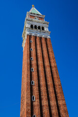 Wall Mural - 98.6 meters St Mark's Campanile (Campanile di San Marco, ninth century) - famous bell tower of St Mark's Basilica. Piazza San Marco, Venice, Italy.