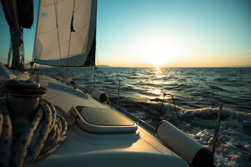 Wall Mural - An sail luxery Boat in regatta during sunset.