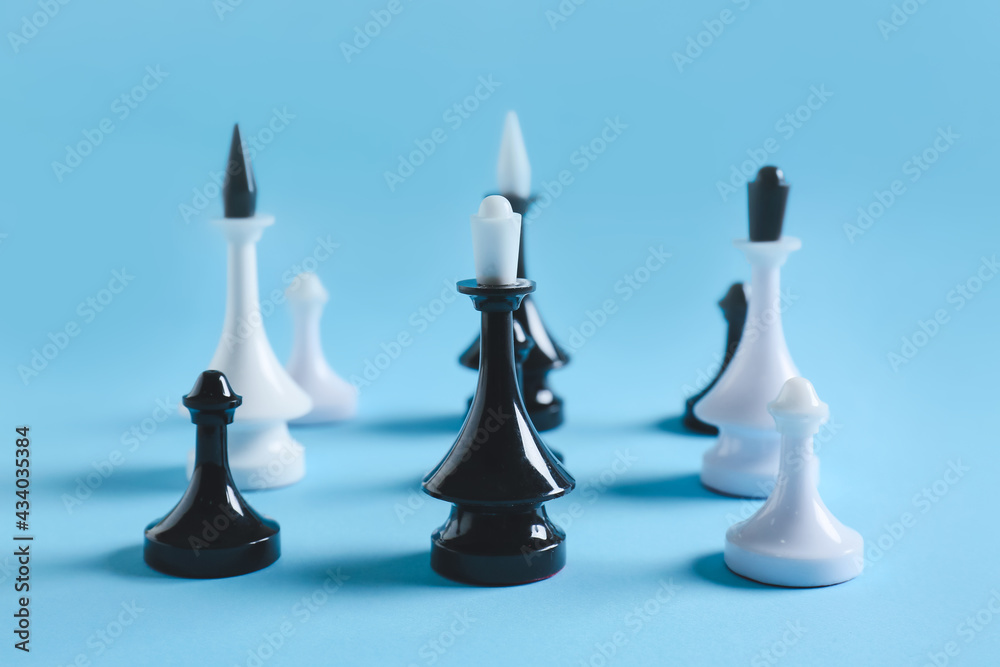 Chess pieces on color background