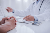 Fototapeta  - Close up of patient and doctor taking notes. healtcare and assistance concept..