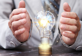 Poster - Hand holding light bulb and business ideas concept, technology innovation