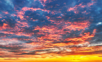 Only sky at sunset, abstract view with red and orange clouds