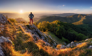 Poster - Slovakia mountain peak Drienok at sunset - panorama landscape with man silhouette