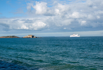 passenger ferry leaving the port of saint malo in the morning in the direction of united kingdom