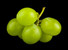Green Grapes Isolated On Black Background Close-up.