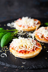 Canvas Print - Mini pizzas with sausages and cheese