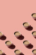 Cup of coffee pattern on pink background with place for text. Sunlight minimal trendy concept