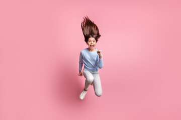 Poster - Full length body size view of nice trendy funky cheerful girl jumping running fast motion isolated over pink pastel color background