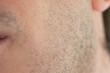 © Octavian - Caucasian male short unshaven facial hair stubble macro close up shot unrecognizable face
