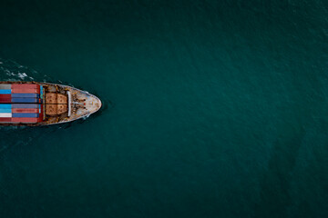 Aerial top view container cargo ship in import export business commercial trade logistic and transportation