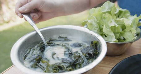 Wall Mural - Hot and delicious healthy Korean Seaweed Soup or Miyeokguk, A Post Natal Food In South Korea, Food after giving a birth