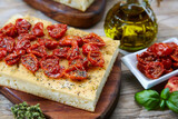 Fototapeta Mapy - Italian pizza with dried cherry tomatoes and oregano