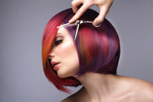 Beautiful Woman With Multi-colored Hair And Creative Make Up And Hairstyle. Beauty Face.