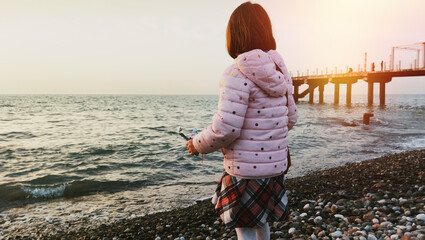 Wall Mural - Little girl at the beach