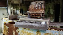 Rustic Antique Cash Register In Abandoned Store In Pripyat, Zoom Out View