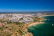 "Ponta da Piedade" - Portuguese southern golden coast cliffs. Aerial view over city of Lagos in Algarve, Portugal.