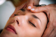 © Microgen - CST therapist Massaging Woman’s Head. Craniosacral Therapy Massage.