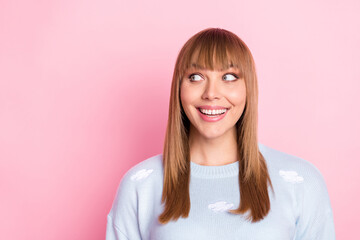 Wall Mural - Portrait of attractive curious cheerful girl looking aside copy empty space advert isolated over pink pastel color background