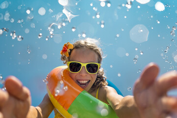 Wall Mural - Spring break! Happy child having fun on summer vacation