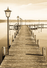 Poster - old wooden jetty at a lake in bavaria