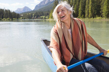 Mature Woman Enjoying Canoe Ride