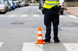 The police officer, the traffic on the road. cop to be near the crosswalk. Traffic Police Officer