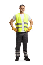 Full Length Portrait Of A Waste Collector In A Uniform And Gloves
