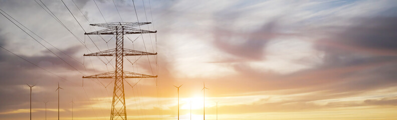 Wall Mural - panoramic - power tower and wind power plant in sunset