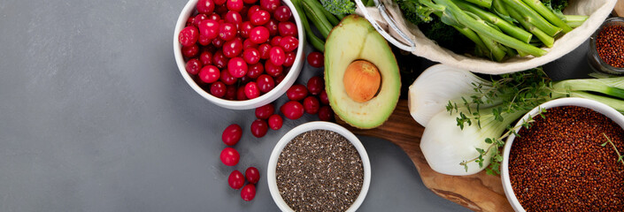 Wall Mural - Assorted vegetables and cereal on gray background. Healthy food concept.