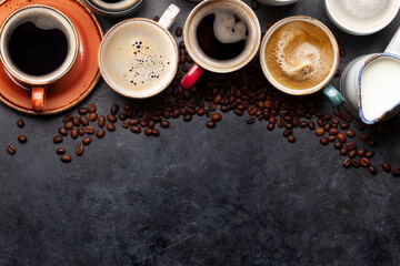 Wall Mural - Many cups of coffee on stone table