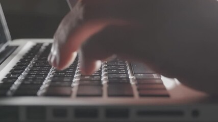 Poster - close up Shallow focus hand hold Credit Card and other hand key in keyboard. Background for E-commerce and online shopping concept.