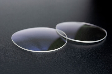 Image of the lens before it is attached to the frame of the glasses.