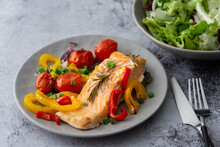 Baked Red Fish Fillet Arctic Char On A Plate With Vegetables, Mix Salad In A Bowl, Delicious Hearty Healthy Dinner