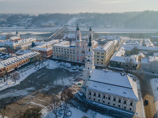 Wall Mural - Aerial panorama of Kaunas city (Lithuania) old town, located in confluence of two river. City hall in the main square, cathedral, other churches and snowy roofs.