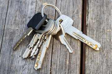 Aufkleber - a bunch of keys lies on a wooden surface. Loss