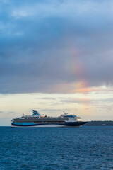 Wall Mural - Sunset and Rainbow over Cruise ferries in Torquay, Devon, England, Europe