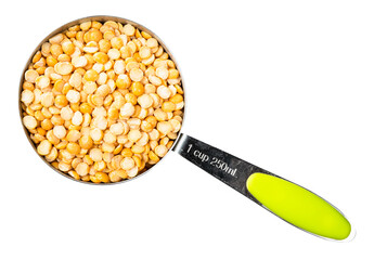 Wall Mural - dried split yellow peas in measuring cup cutout