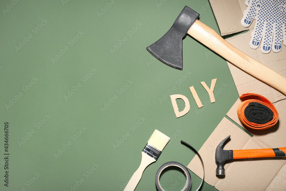 Set of tools and word DIY on color background