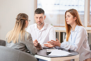 Sticker - Young couple visiting divorce lawyer in office