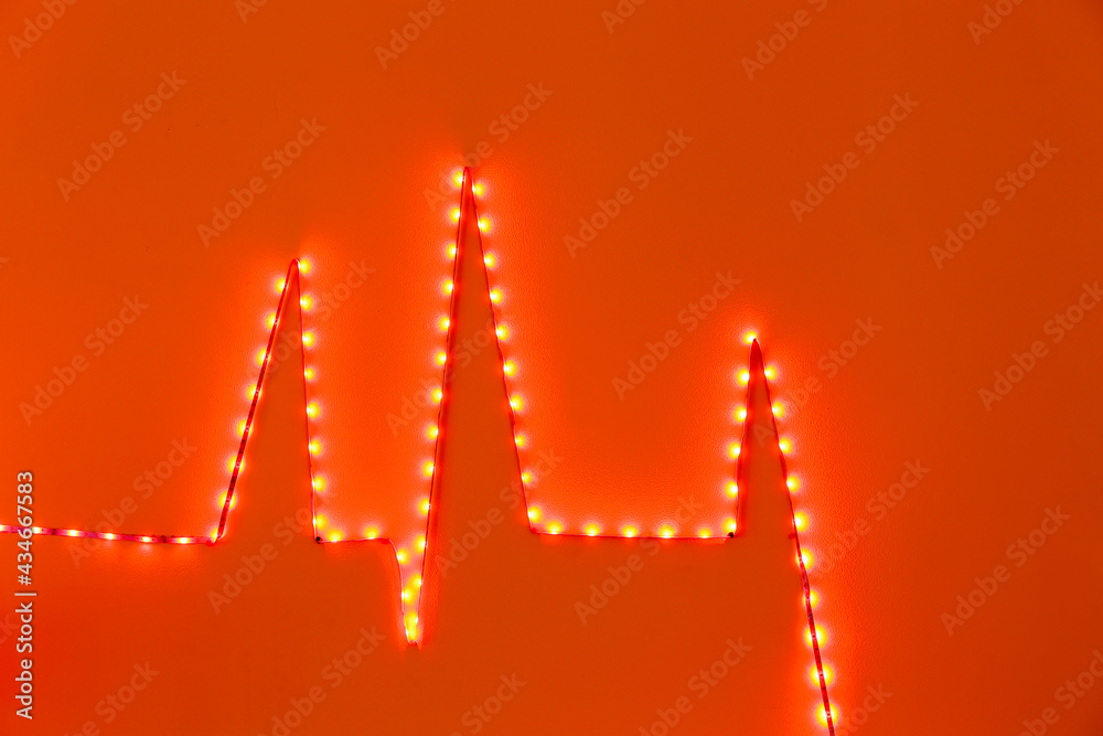 Bright neon garland on color background