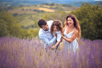 Wall Mural - Happy family in lavender field.  Summer is for family.