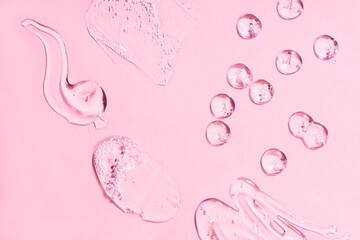 Wall Mural - Drops of different forms of hyaluronic acid, pink background. Cosmetics concept.