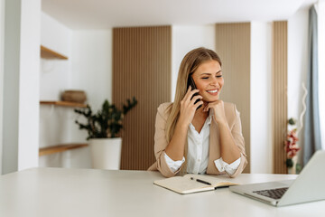 Woman talking to someone, break from work.