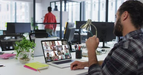 Poster - Middle eastern man talking on video conference with office colleagues on laptop at office