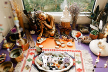 Buddha's Home Altar With Stones And Offerings