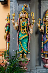 Wall Mural - Colourful statues of Hindu religious deities adorning the interior of a Hindu temple in Singapore.