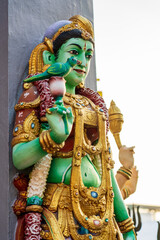 Wall Mural - Colourful statues of Hindu religious deities adorning the interior of a Hindu temple in Singapore.